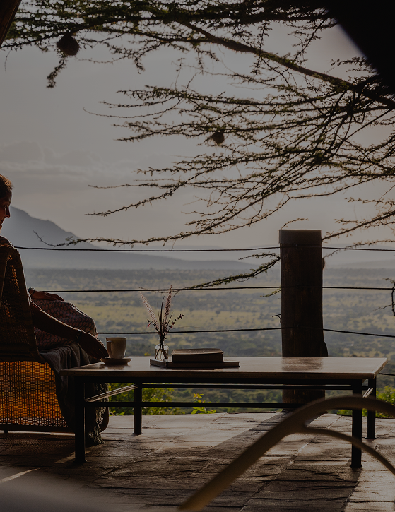 A serene tented camp nestled in lush greenery, representing the Olderkesi Conservancy in Kenya’s Maasai Mara, where Cottar’s 1920s Camp blends vintage style with modern comfort and privacy