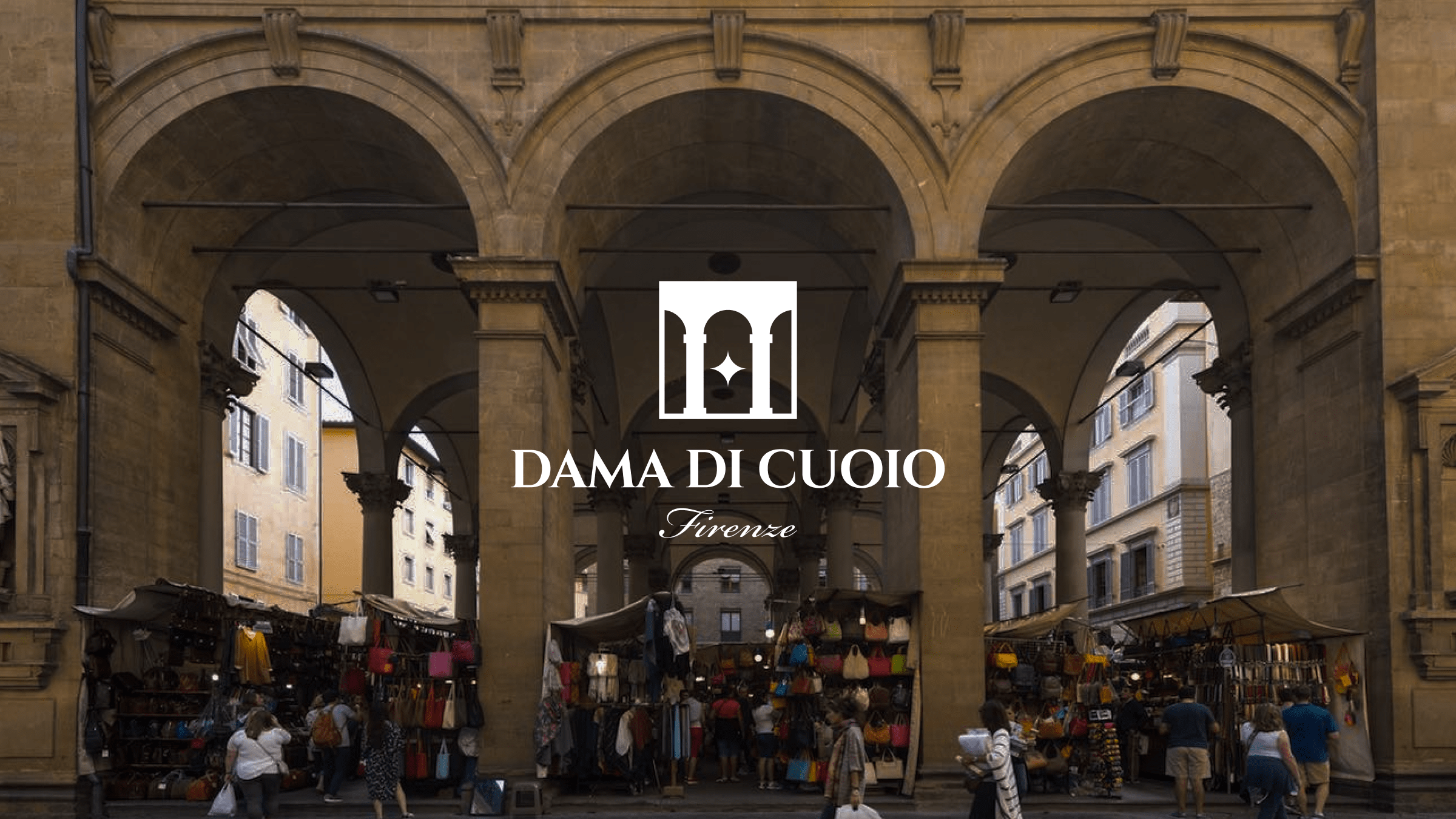Dama di Cuoio Florence leather goods logo design overlaid on historic Mercato del Porcellino Renaissance arches and traditional market stalls