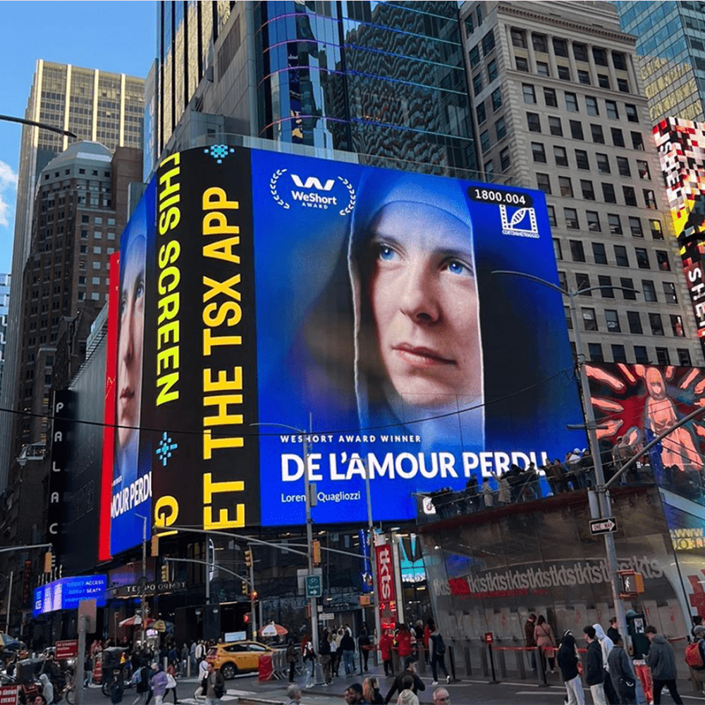 WeShort short film streaming platform Times Square billboard advertisement featuring award-winning film 'De L'Amour Perdu' in New York City digital display