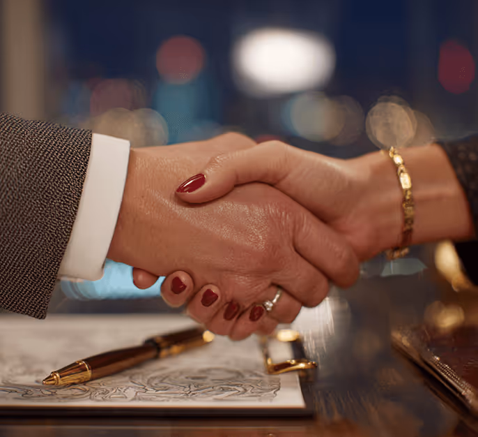 Business handshake with pen and document, sealing professional agreement