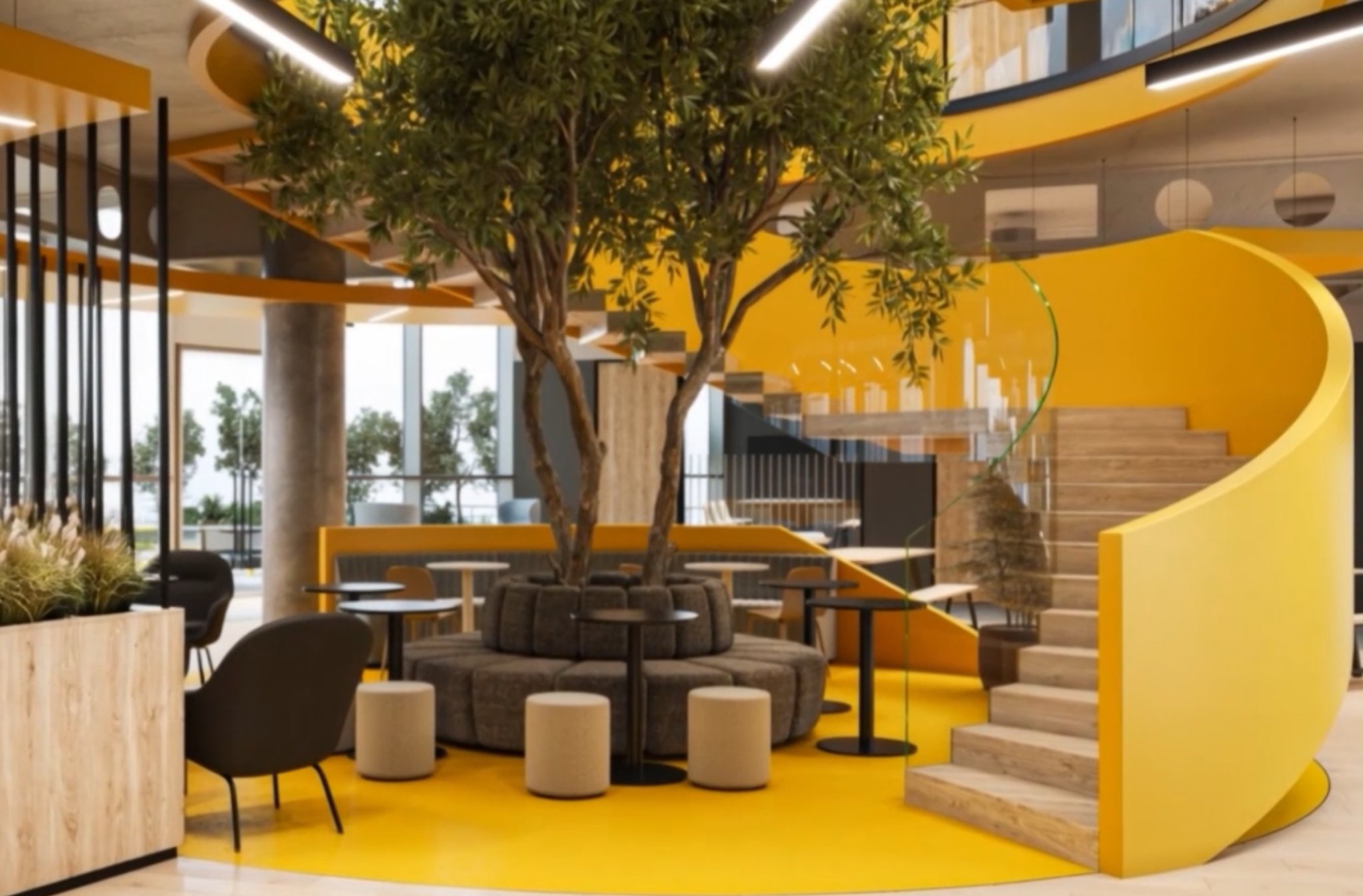 Modern lounge with central tree seating, yellow floor, circular staircase, and scattered tables and chairs.