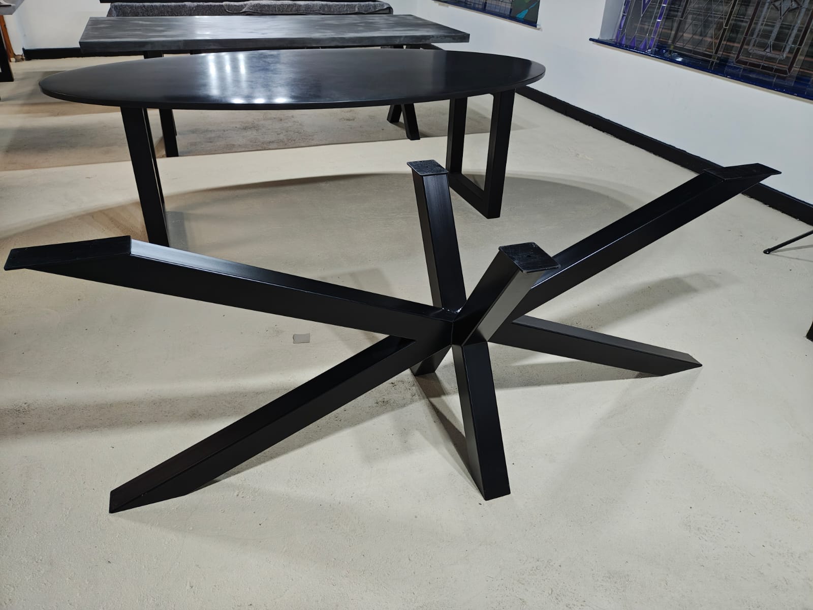 Black steelspider frame dining table base for rectangular tops