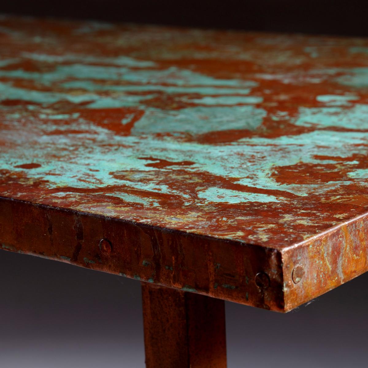 Concrete and metal alloy dining table styled in modern interior