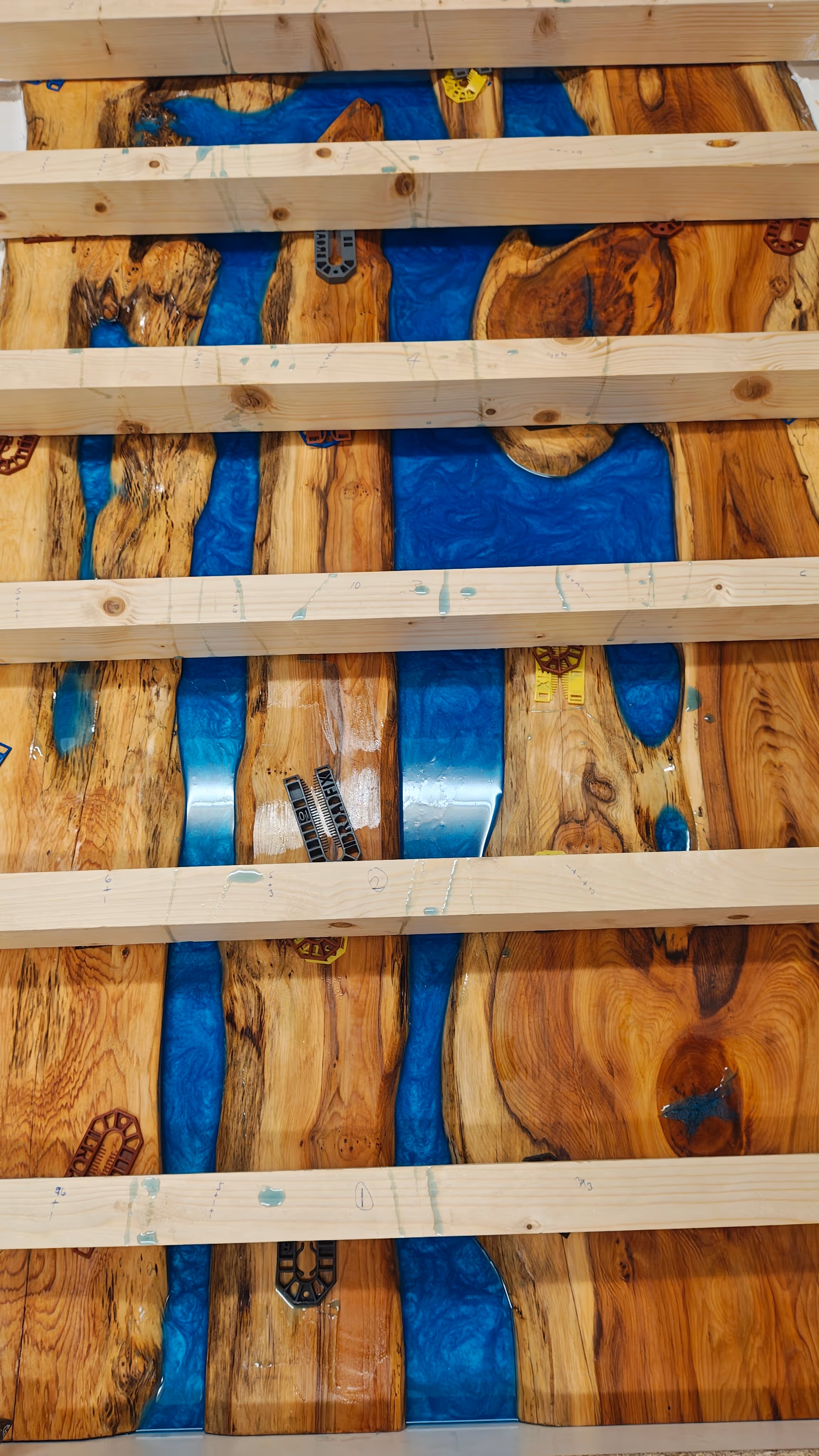 Yew wood and Blue Shimmer resin being poured (haffway there) - slow and meticulous work