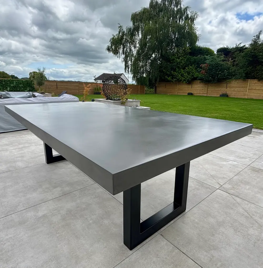Close-up detail of a handcrafted polished concrete tabletop

