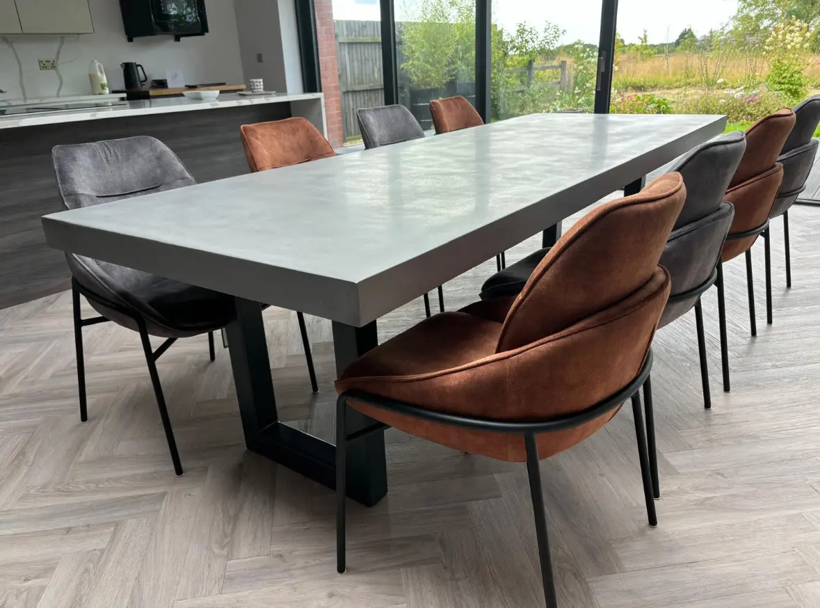 Polished concrete table in a modern dining room