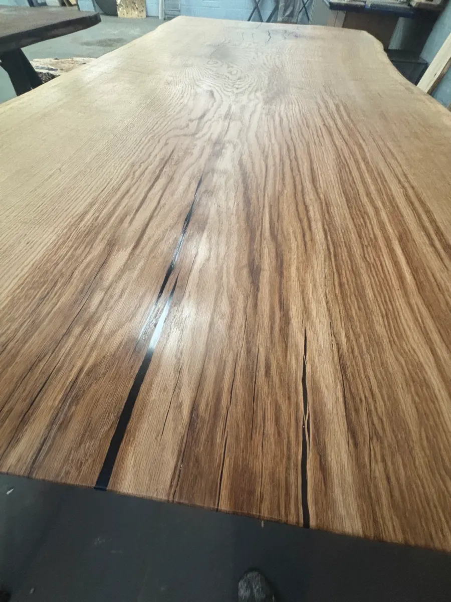 Partners reviewing design plans for a bespoke furniture project