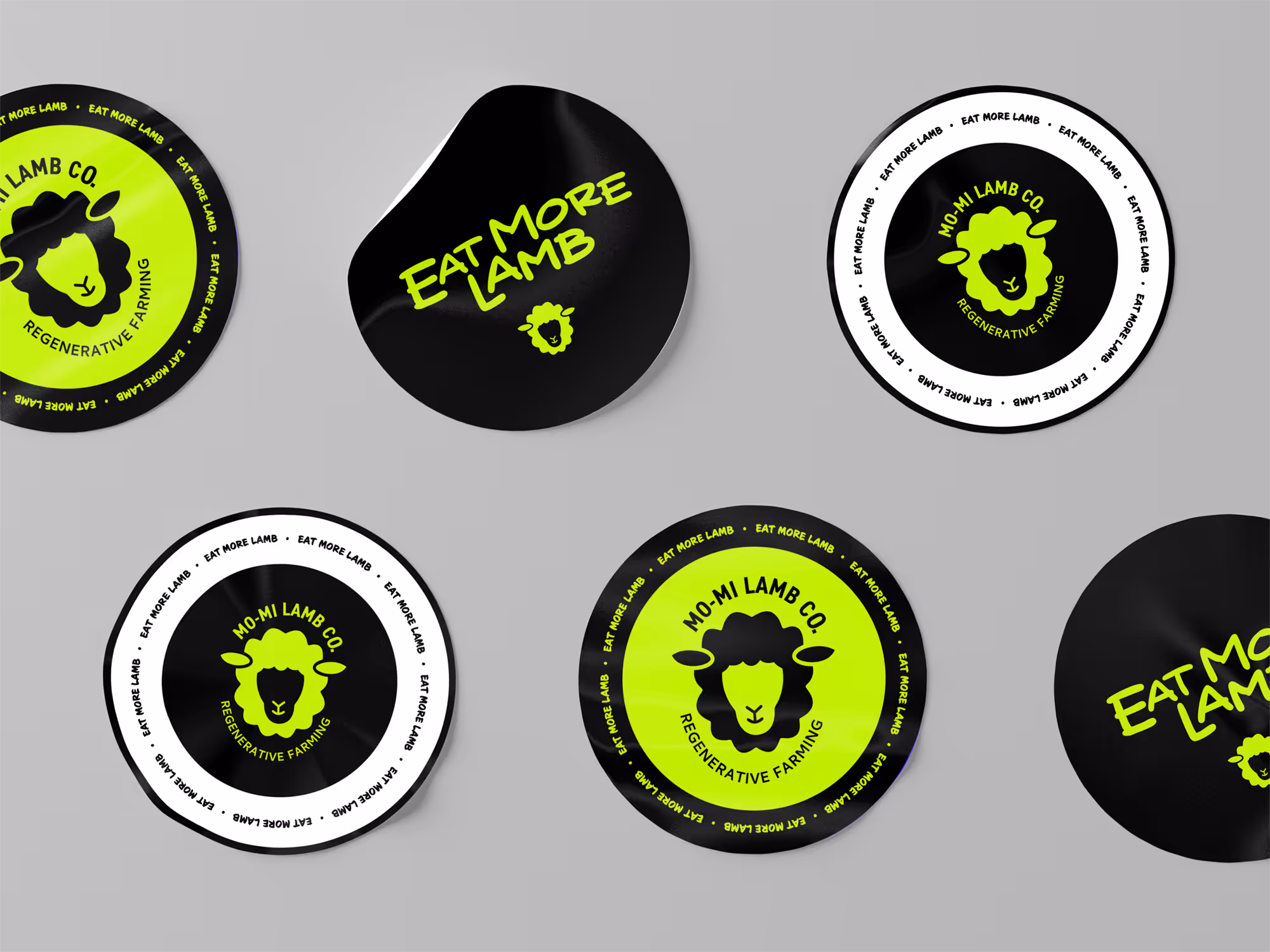 Eat More Lamb stickers in black and neon green with sheep logo