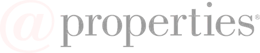 Logo of @properties real estate company with a stylized at symbol.