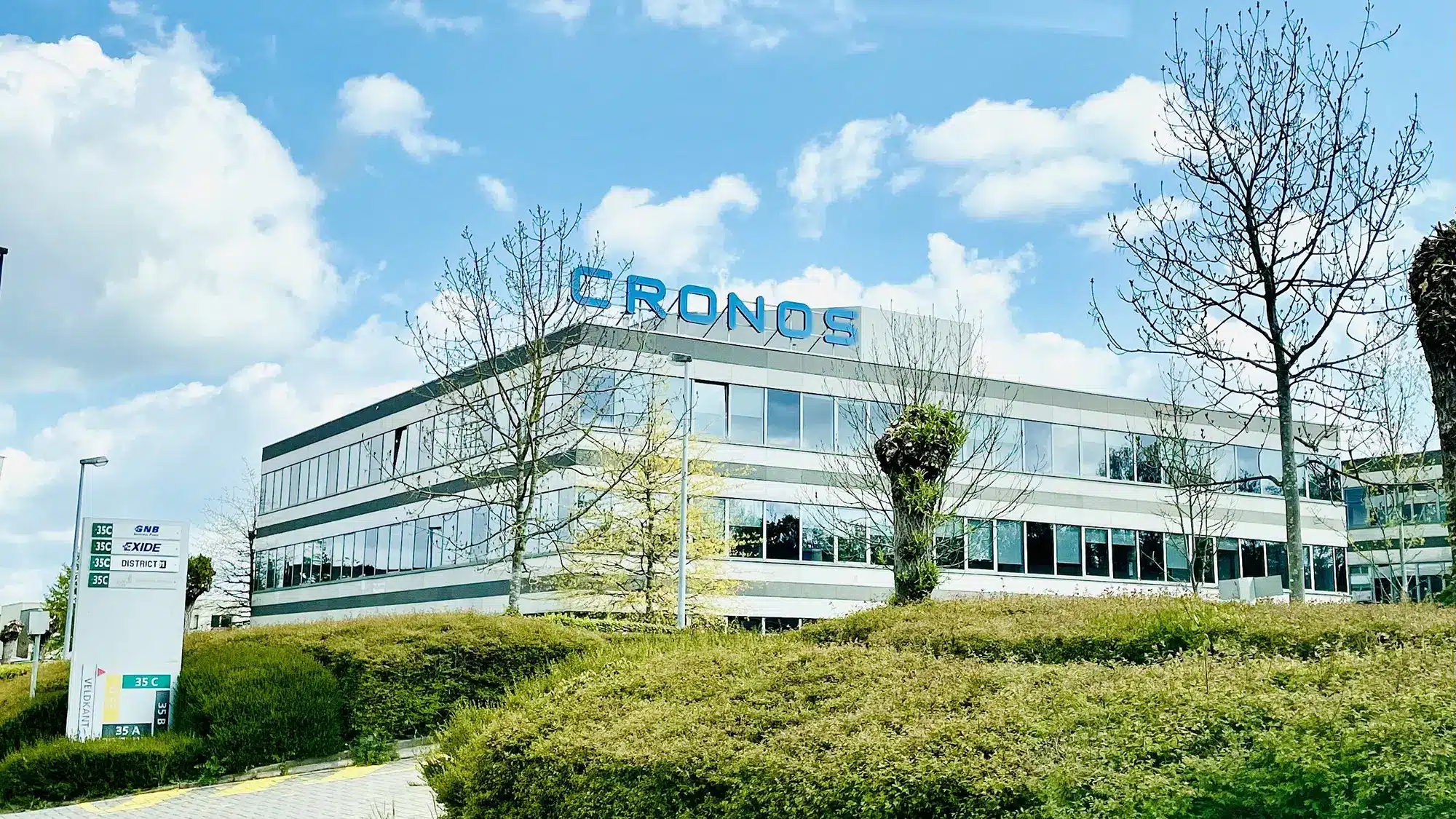 Cronos Building on a bright sunny day
