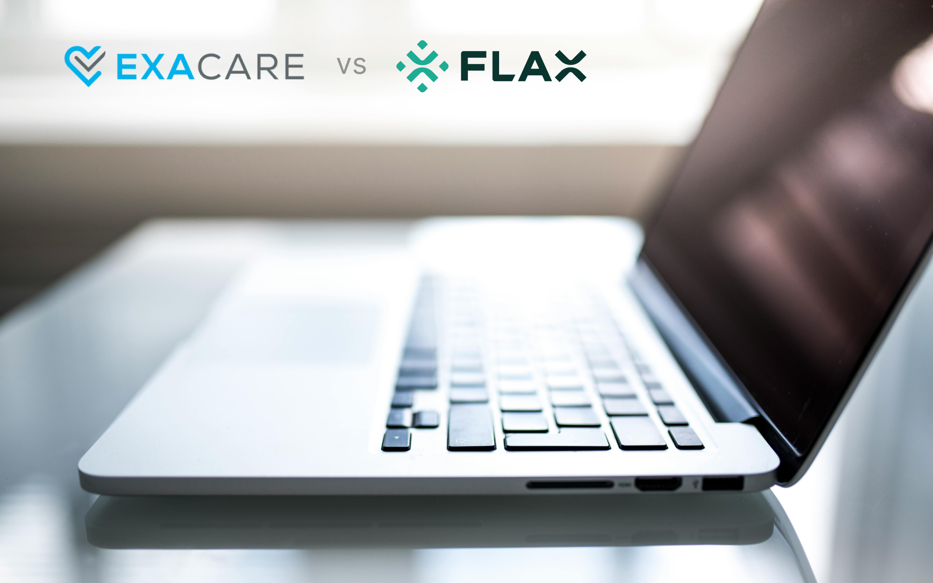 Laptop computer with Exacare and Flax logos