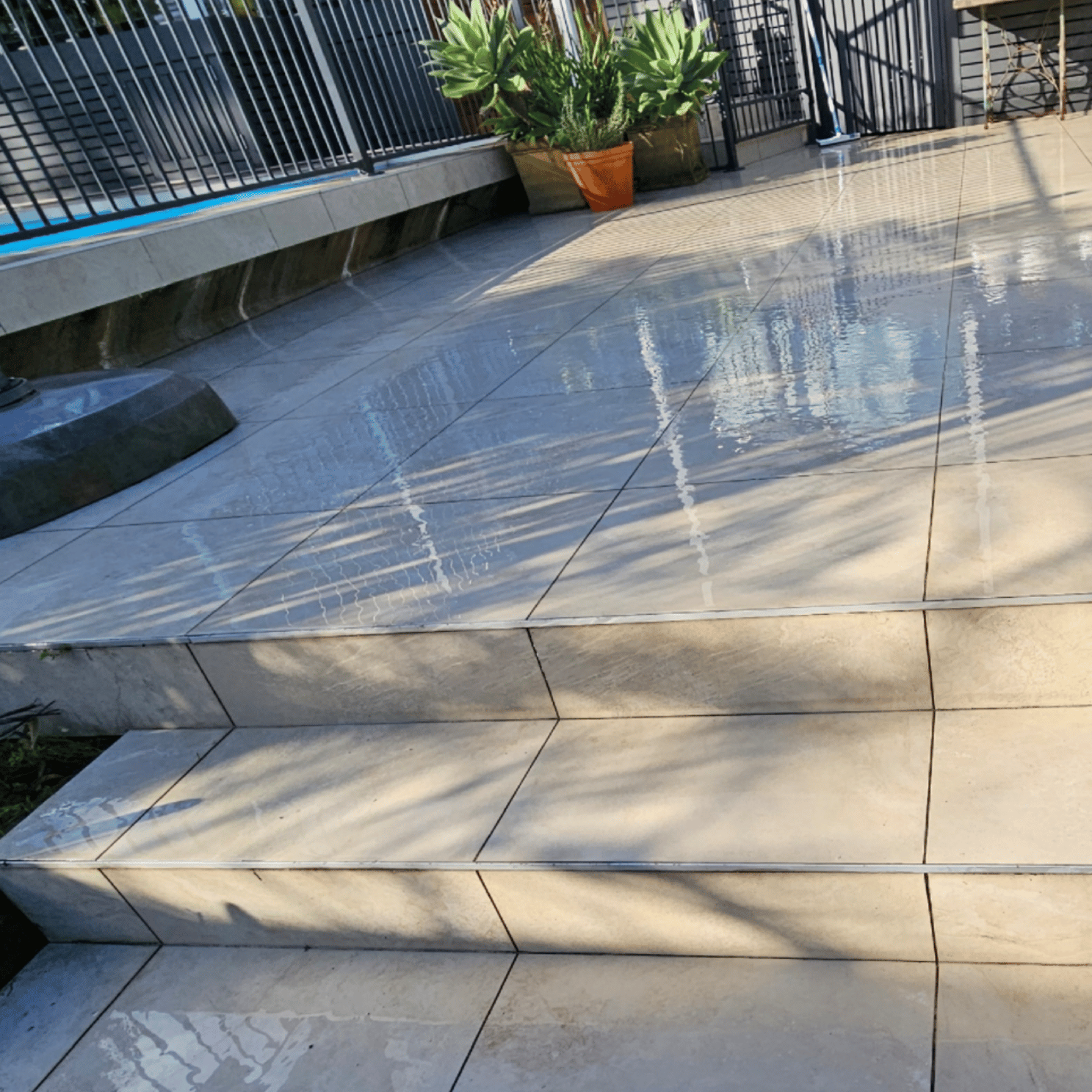 Outdoor cleaning Sydney - Spotless Interior Cleaning washes patios and paths. Westmead based