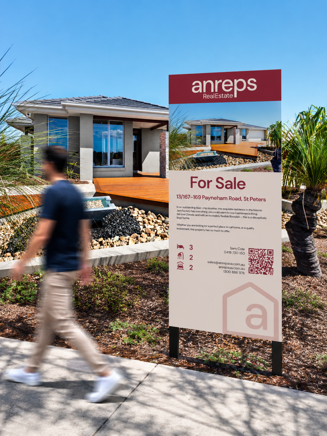 Anreps Real Estate A-frame street sign in burgundy and cream, from the Longshot Studio brand identity project