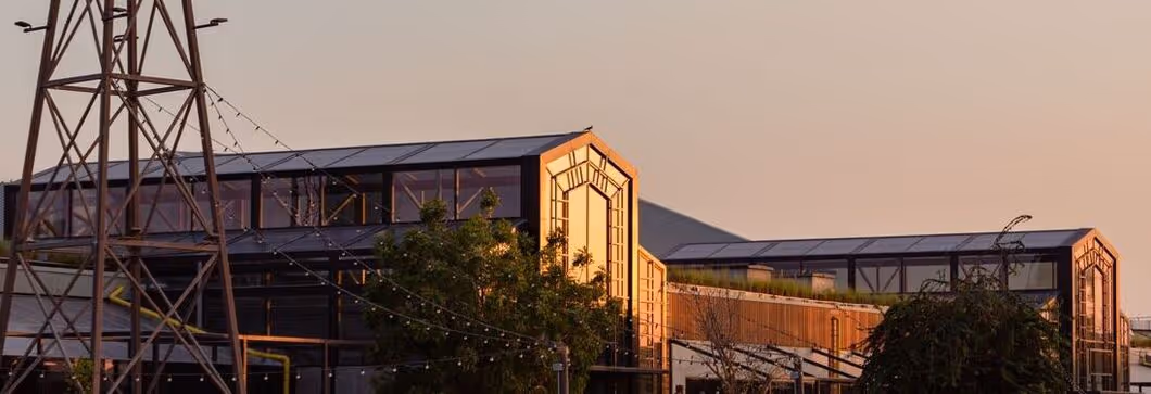 Al Khawaneej Walk with sunset glowing on the building