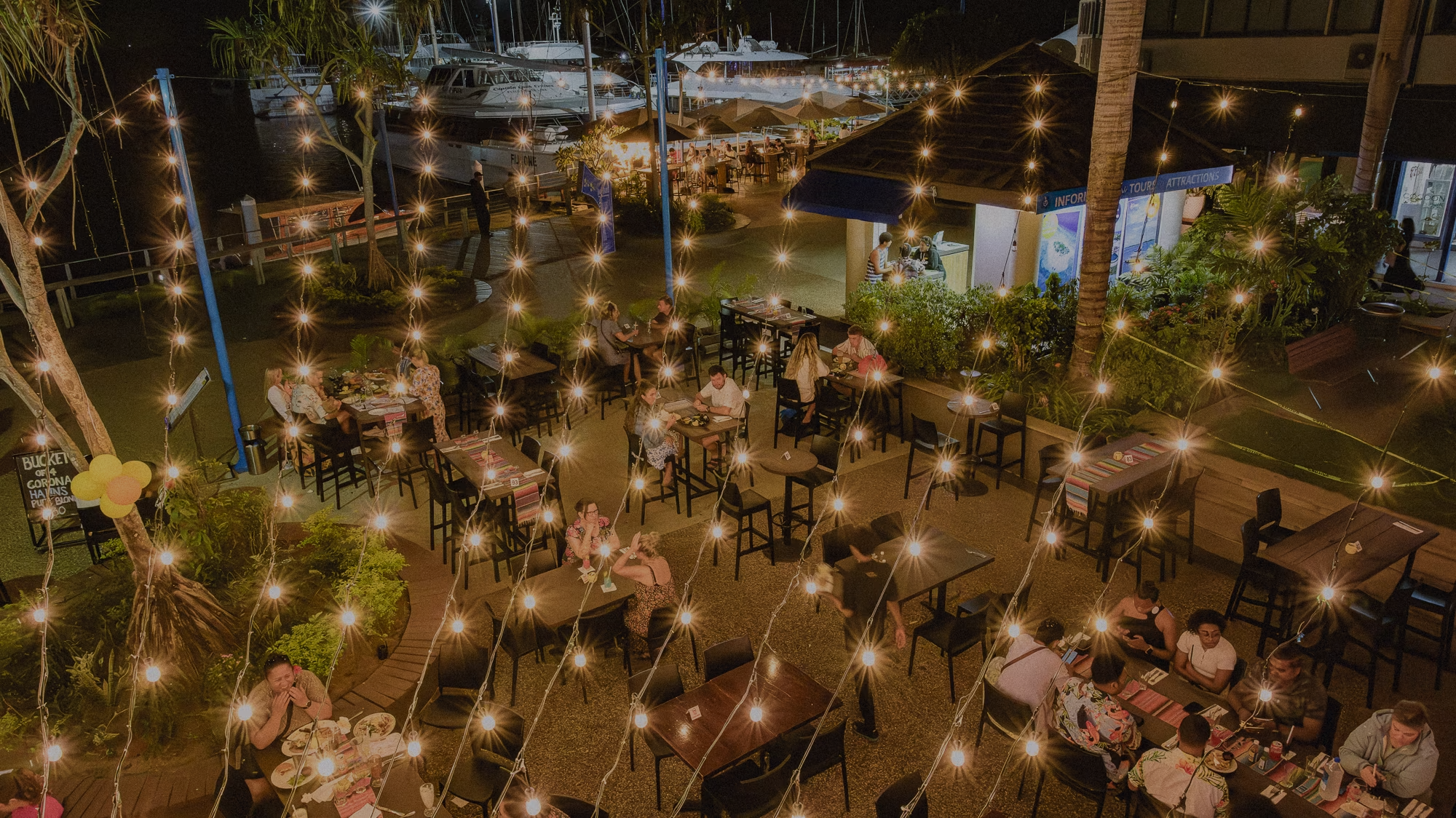 Friends dining together at Cantina Grill & Bar, Port Denarau Marina