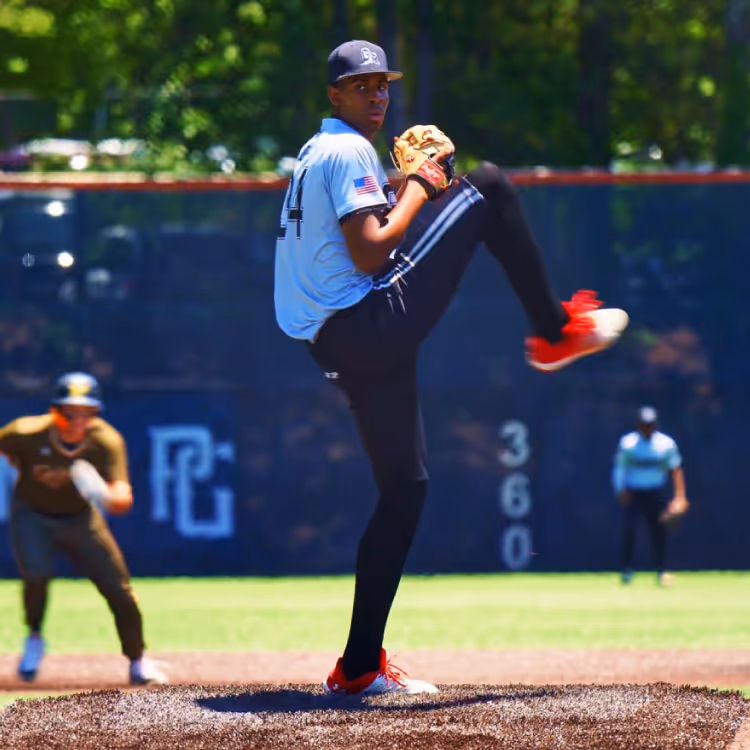 Baseball pitcher pitching the ball