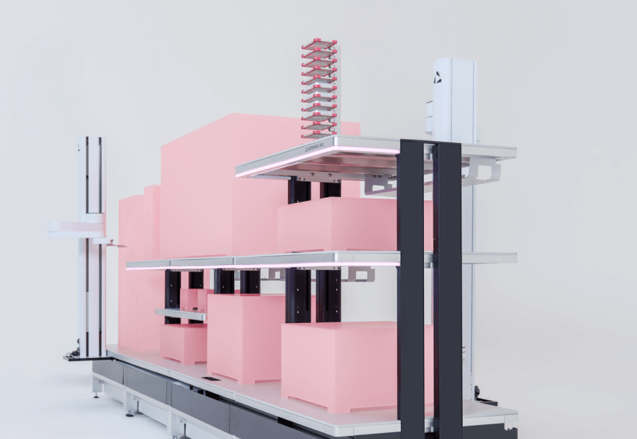 Automated vertical rack system with pink storage boxes on multi-level shelves in a white environment.