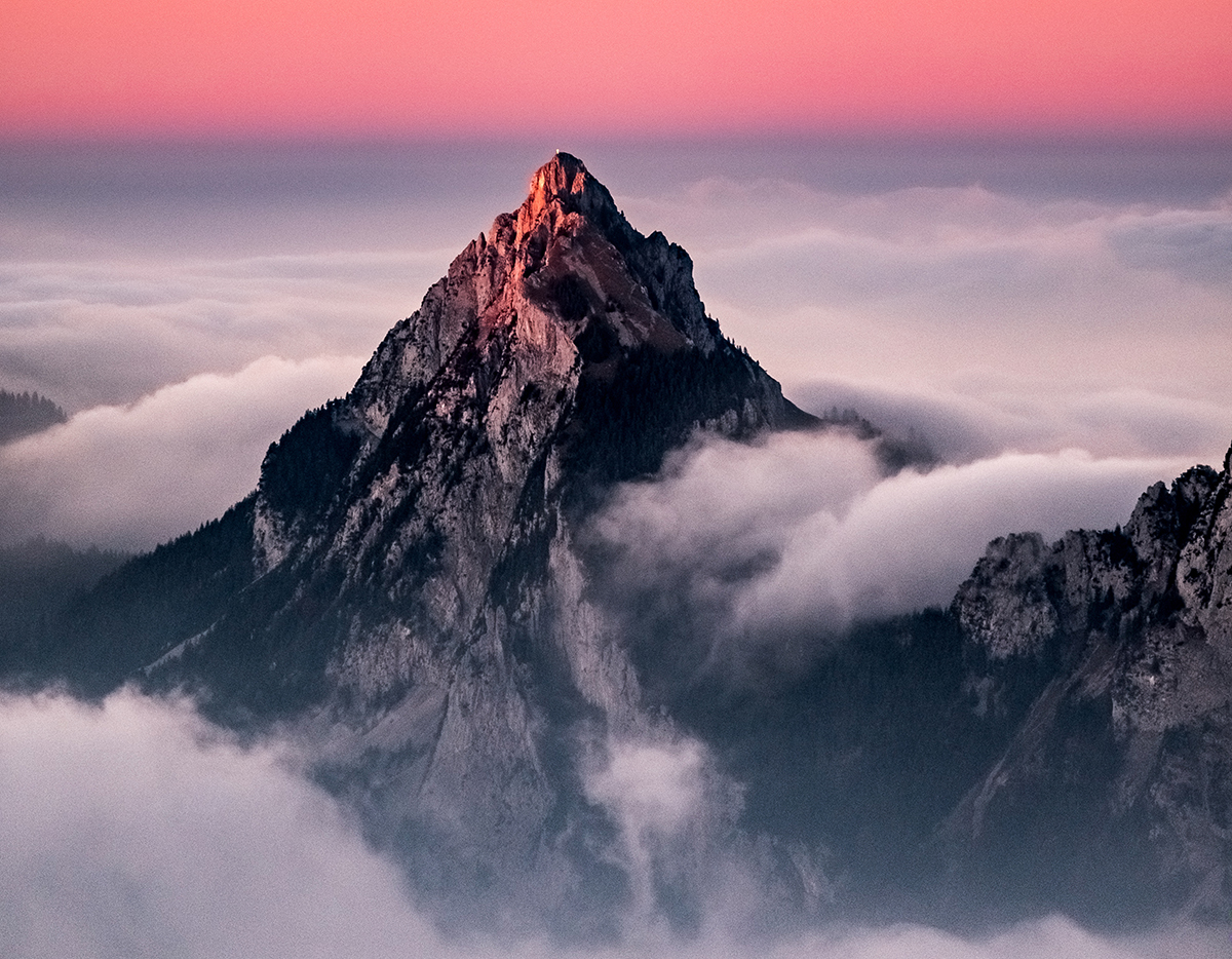 A mountain peak representing how IT can help a business achieve more with IT that is designed to empower people.