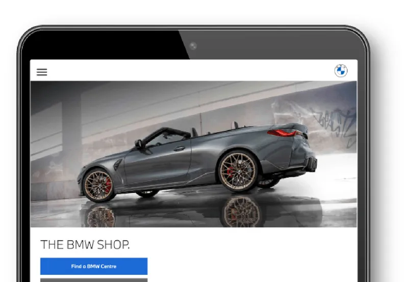 A tablet that displays the BMW Shop website