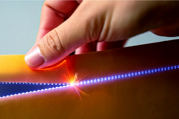 Laser close-up scoring packaging film on the Multi-Head Laser System