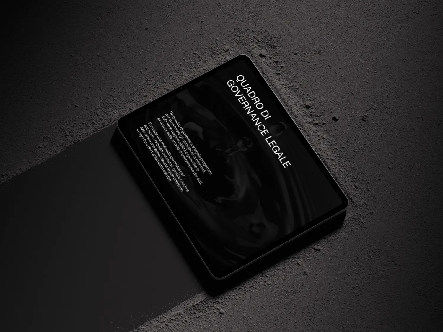 Tablet displaying text titled 'Quadro di Governance Legale' on a dark textured surface with dramatic lighting.