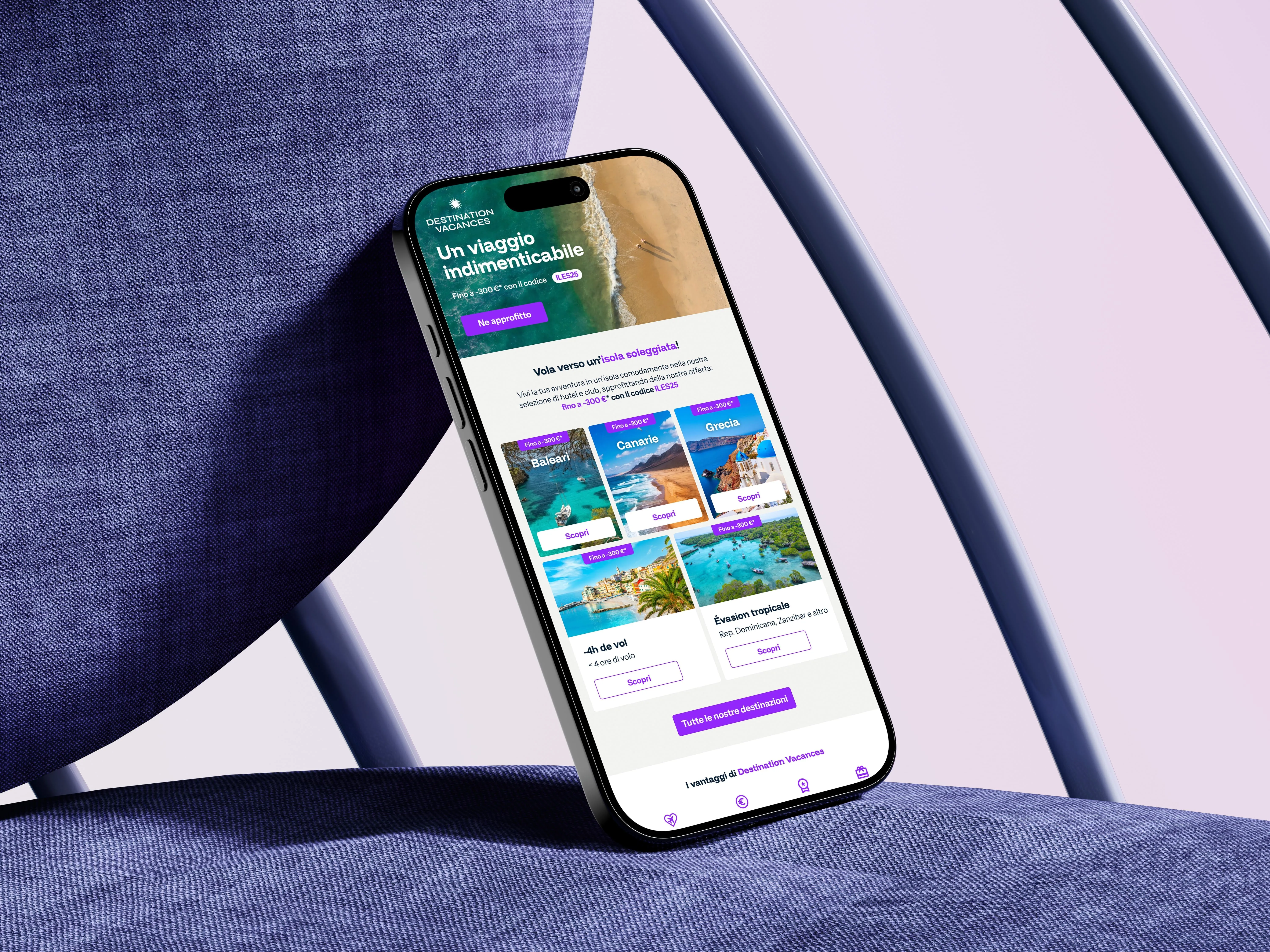 Smartphone leaning on a blue textured chair showing a travel app with offers for beach destinations including Balearic Islands, Canary Islands, Greece, short flights, and tropical escapes.