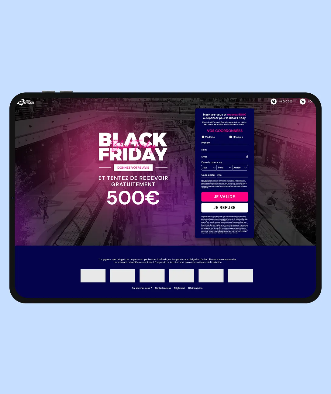 Black Friday survey page on a tablet screen offering a chance to win 500€ with a sign-up form on a blurred shopping mall background.