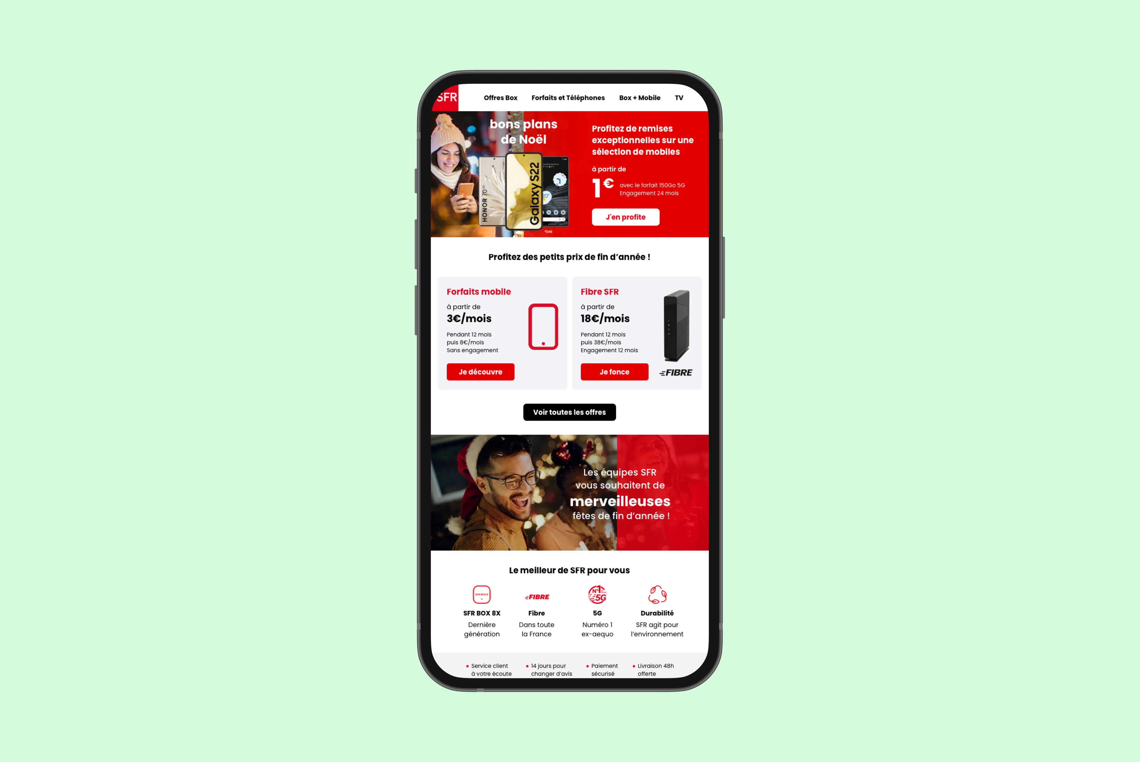 Smartphone displaying a French telecom website with holiday mobile and fiber offers, featuring discounted prices and festive greetings.