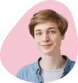 a boy smiling for a picture