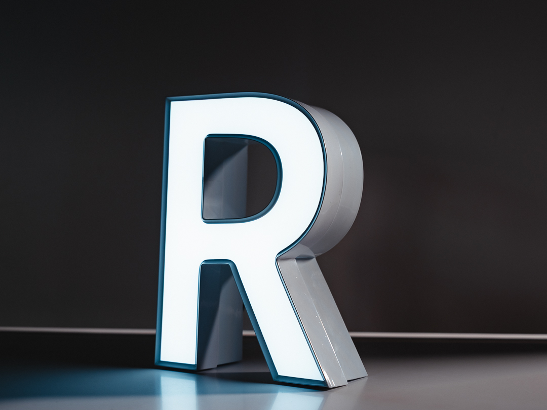 UT1 V-Trim face-lit channel letter with defined aluminum trimcap and bright white LED face.