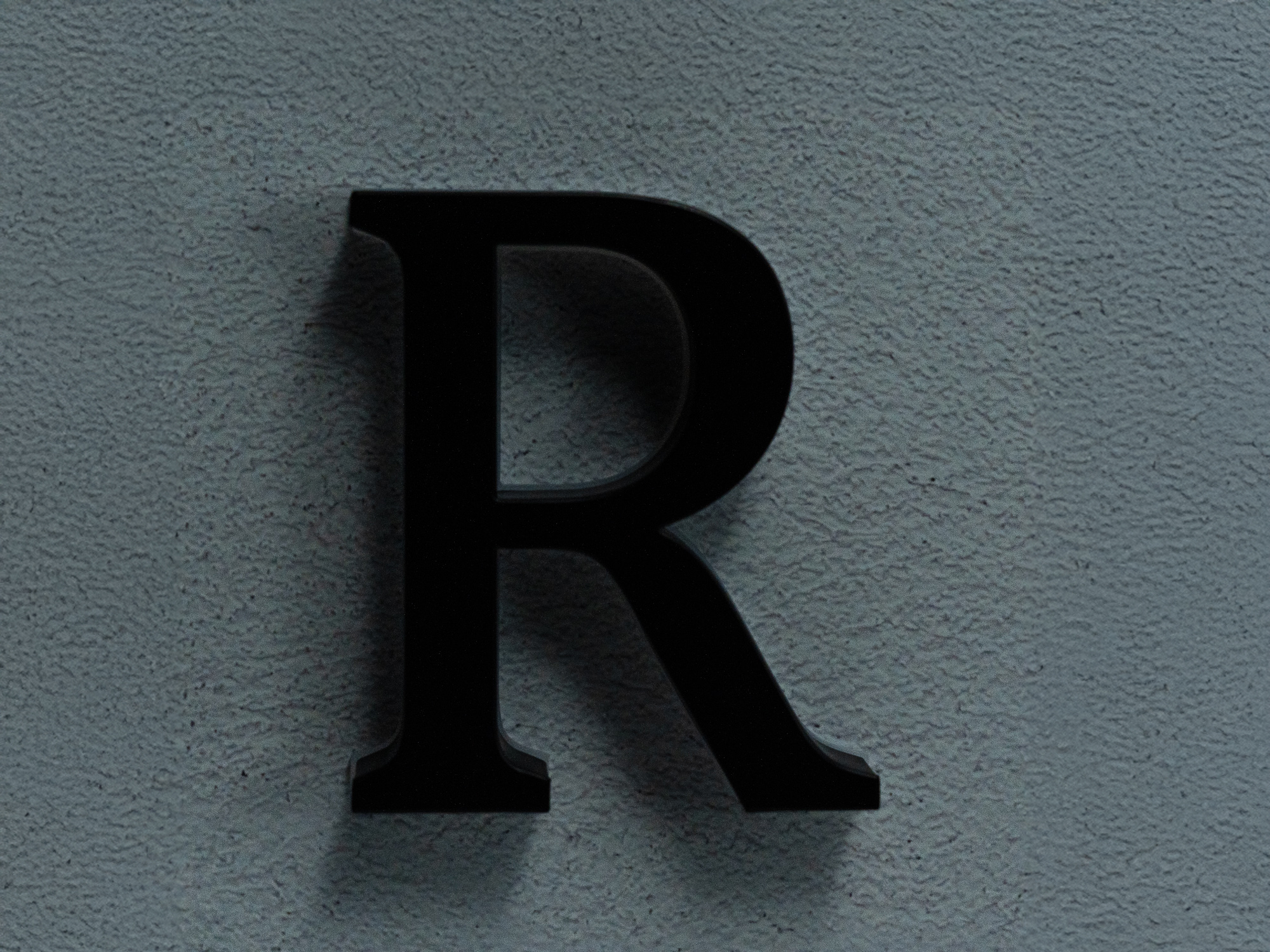 US2 TruTrimless acrylic channel letter with partial side and halo lighting in white and blue tones-Off