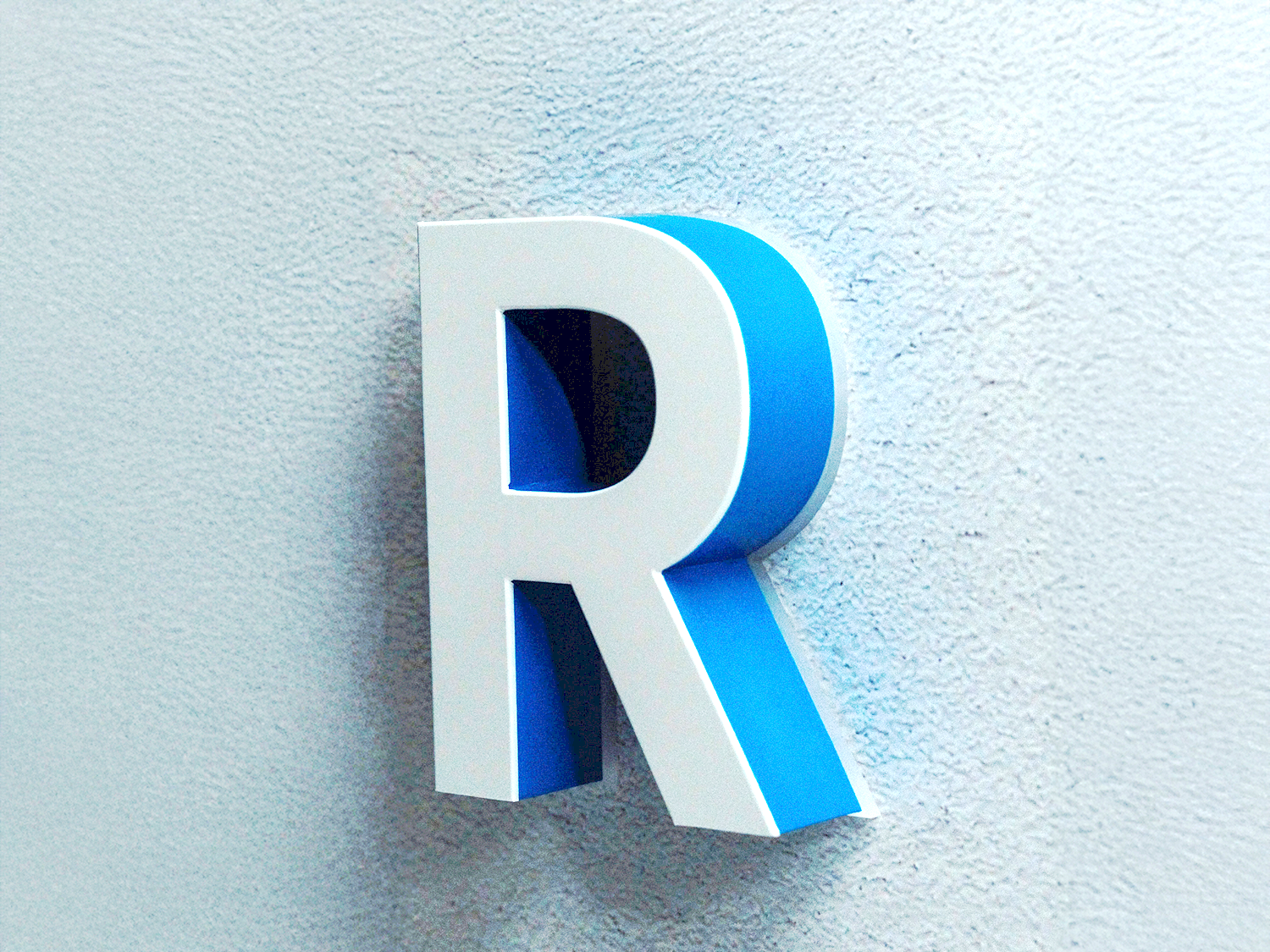 UF1S2 multi-directional face and halo-lit channel letter with white vinyl face and blue halo glow-ON