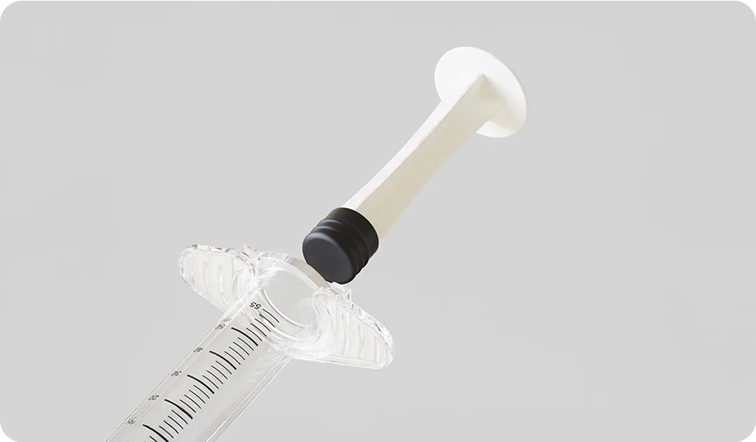 Medical syringe featuring a bio-based plunger made from sustainable material, showcasing Nissha’s innovation in eco-friendly medical packaging solutions.