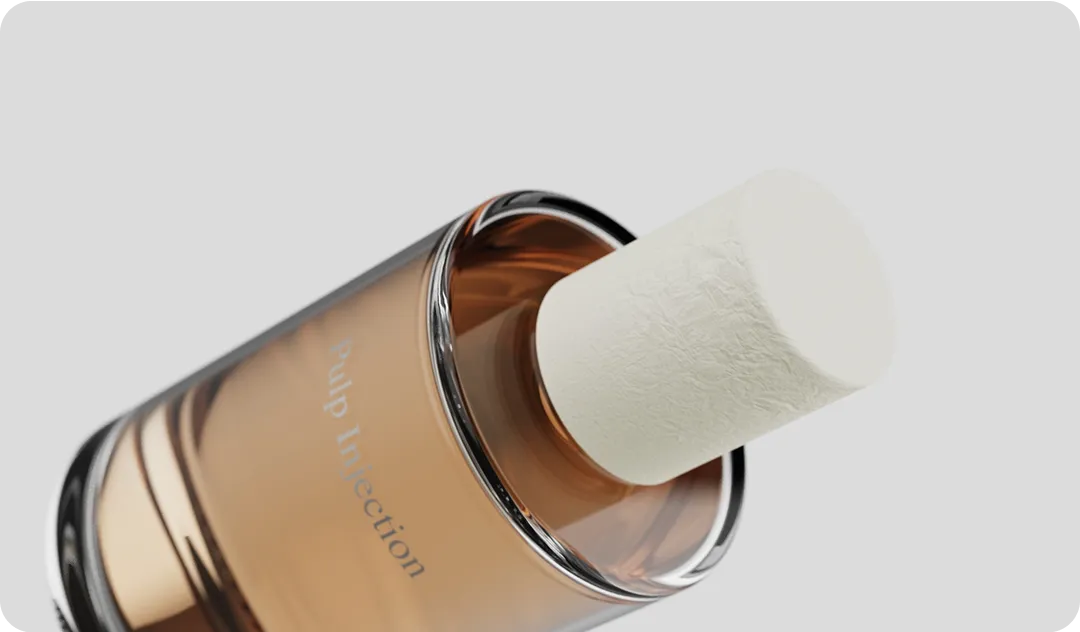 Perfume bottle with an eco-friendly molded fiber cap, showcasing sustainable luxury packaging design by Nissha.