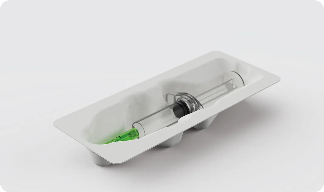 Eco-friendly molded fiber medical packaging tray holding a syringe, recyclable and designed for sterile protection by Nissha.