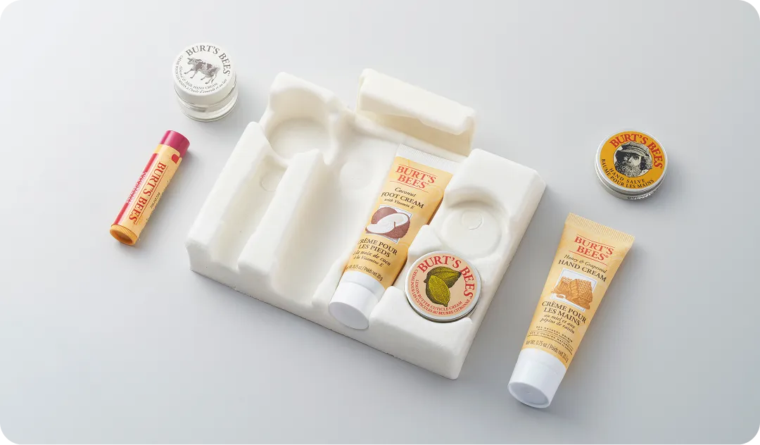 Sustainable molded fiber packaging tray for Burt’s Bees skincare and lip care products, offering eco-friendly protection and premium presentation by Nissha.