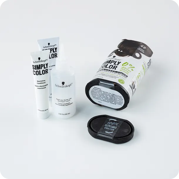 Schwarzkopf Simply Color hair dye kit with eco-friendly molded fiber tray and recyclable carton packaging, showcasing sustainable beauty packaging design.