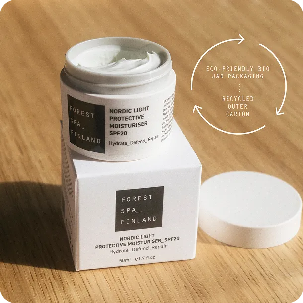 Forest Spa Finland Nordic Light Protective Moisturiser SPF20 in eco-friendly bio jar and recycled paper carton, representing sustainable skincare packaging design.