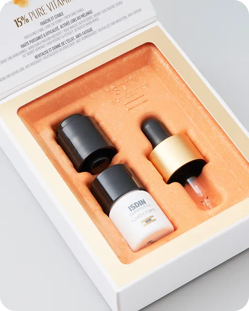 ISDIN Flavo-C Forte 15% Pure Vitamin C serum in luxury molded packaging with golden insert, showcasing premium skincare presentation design.