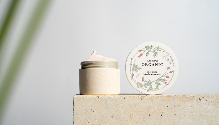 Eco-friendly organic face cream by Nissha ecosense with sustainable packaging and botanical design, promoting natural skincare and minimalistic aesthetics.