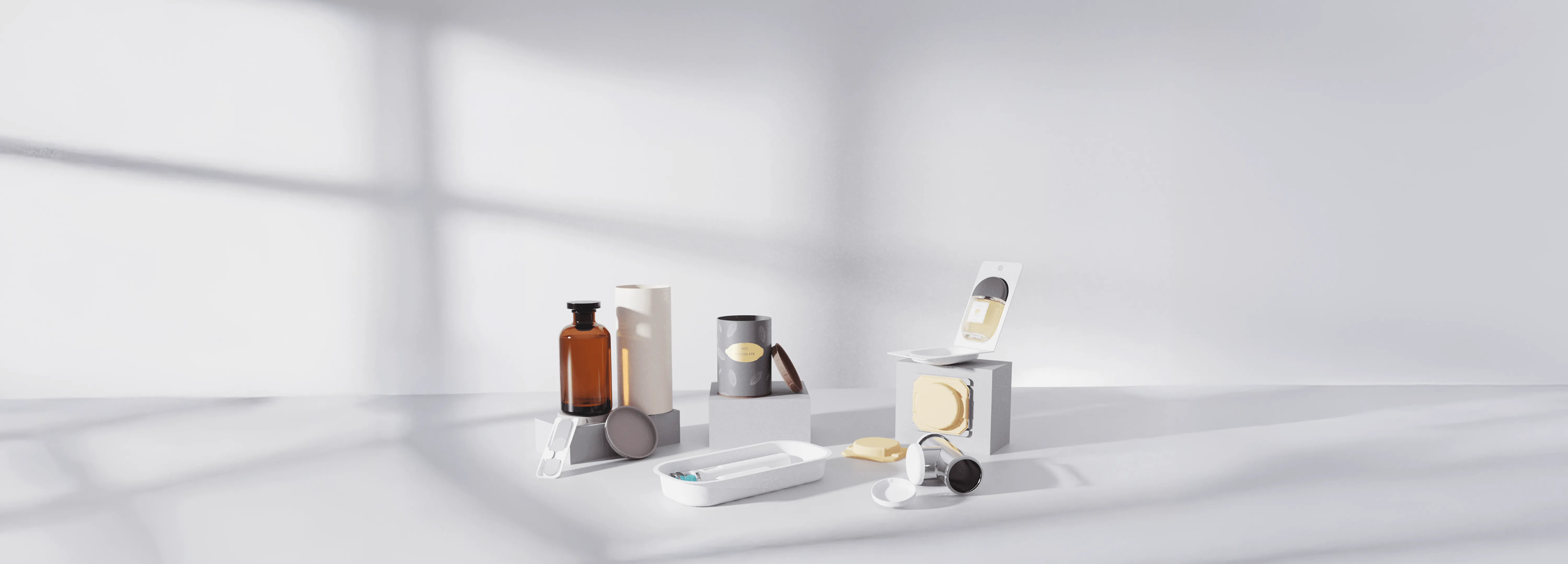 Collection of sustainable packaging designs including glass bottles, molded pulp trays, and eco-friendly containers displayed in minimal studio lighting.