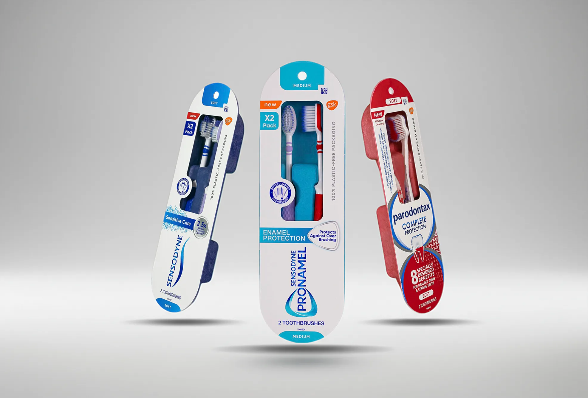 Eco-friendly toothbrush packaging made from molded pulp with plastic-free materials for brands Sensodyne and Parodontax, showcasing sustainable oral care design.
