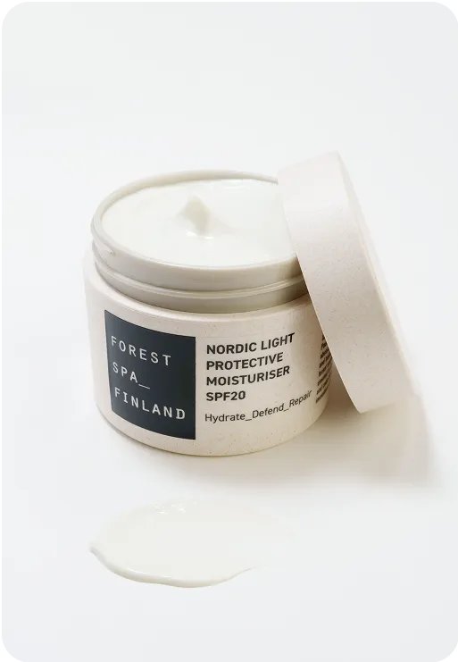 Forest Spa Finland Nordic Light Protective Moisturiser SPF20 in sustainable eco-friendly jar, hydrating face cream with natural Nordic ingredients.