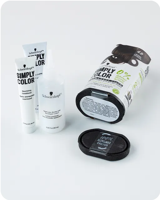 Schwarzkopf Simply Color hair dye kit with eco-friendly molded fiber tray and recyclable carton packaging, showcasing sustainable beauty packaging design.