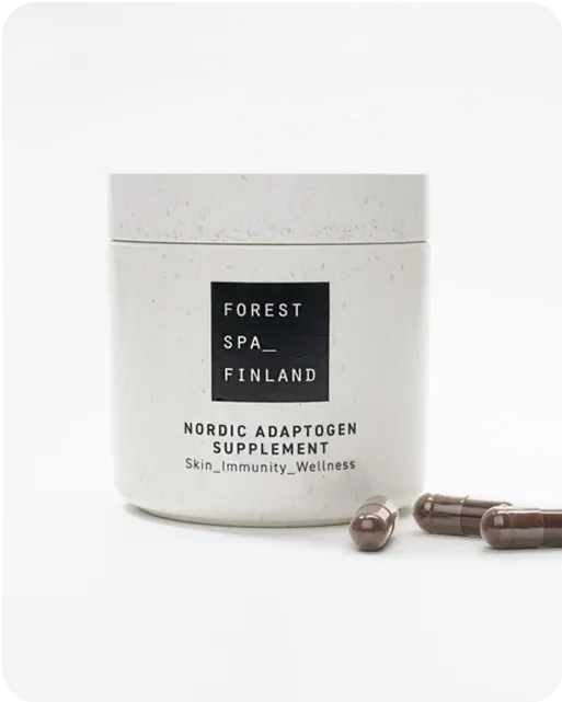 Forest Spa Finland Nordic Adaptogen Supplement in eco-friendly white jar with adaptogenic capsules for skin, immunity, and wellness support.