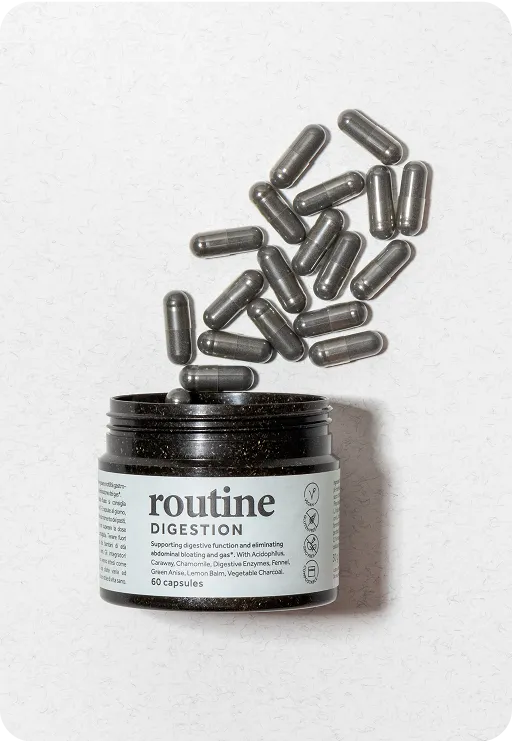 Routine Digestion supplement jar with black capsules spilling out, featuring minimalist eco-friendly packaging design and natural digestive health support formula.