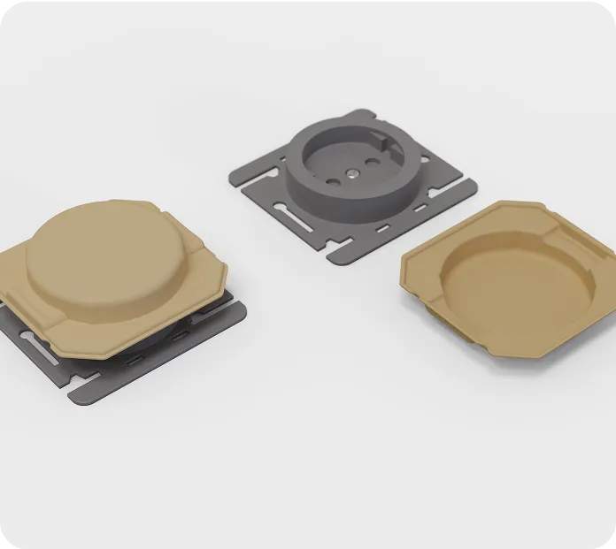 Eco-friendly molded fiber cover aligned with gray socket housing, sustainable protective solution for electronic components.