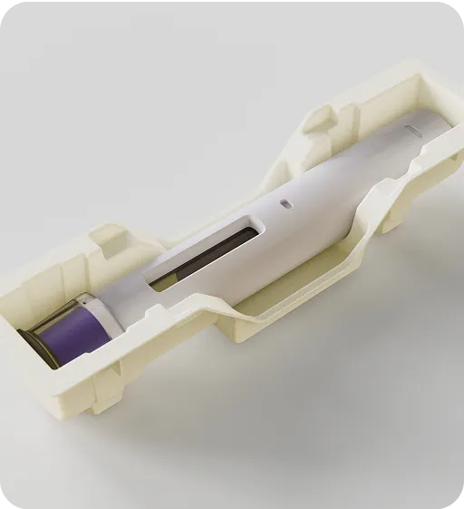 Stacked biodegradable molded fiber trays with pen-shaped medical devices, sustainable and plastic-free medical packaging solution.