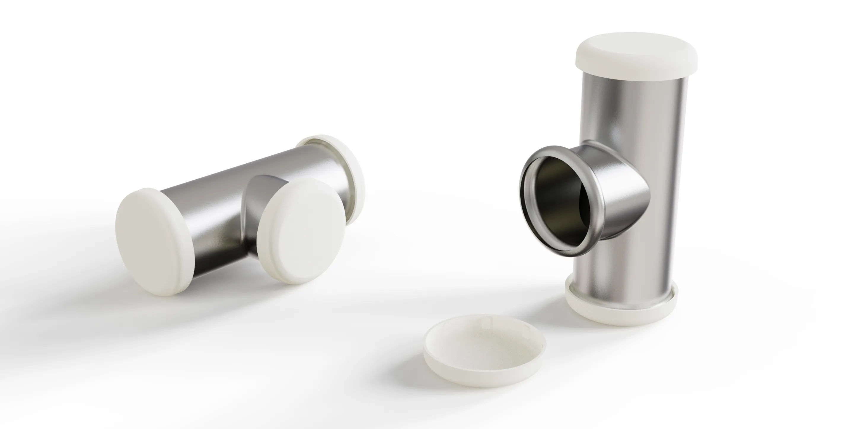 Stainless steel cylindrical containers with white caps on a white background, showcasing precision-engineered design for medical or industrial use.