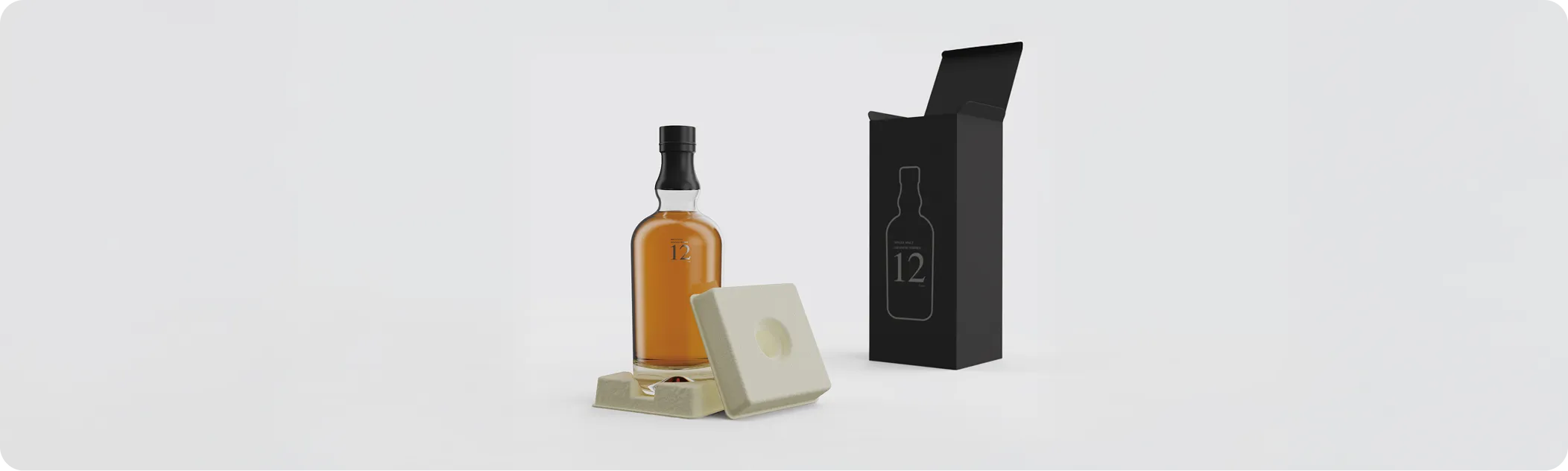 Premium whiskey bottle with molded fiber packaging insert and black box, showcasing sustainable and elegant eco-friendly packaging design.
